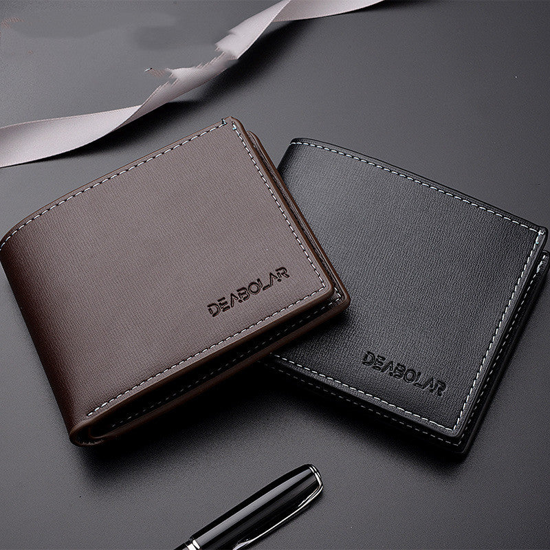 Two leather wallets, one brown and one black, with 'DEASOLAR' branding on a dark surface.